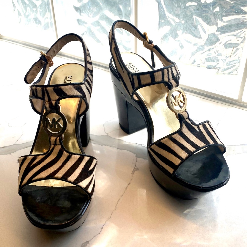 Michael Kors brand new Zebra hair T-strap black patent platform with gold accent